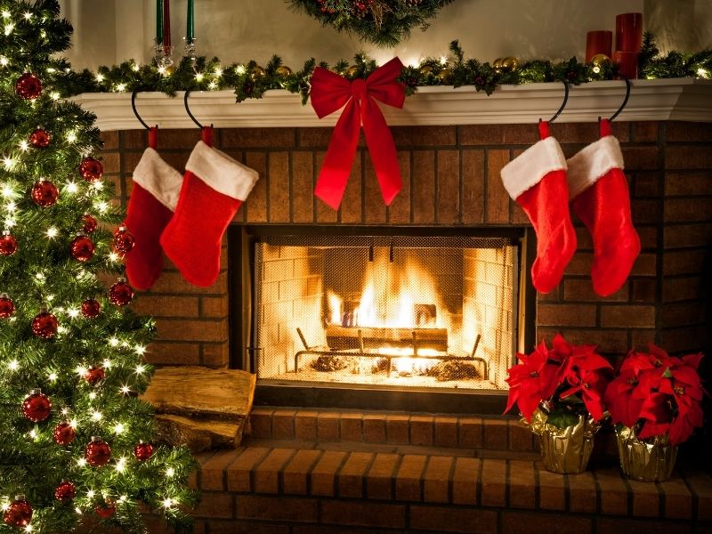 Cozy xmas fireplace with stockings